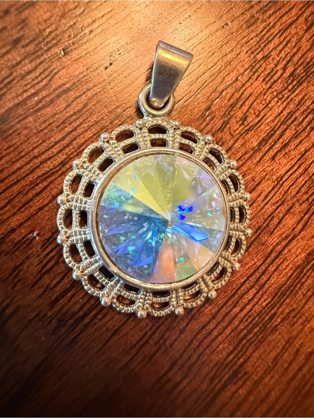 Silver Filigree Pendant with Iridescent Opal-Like Crystal